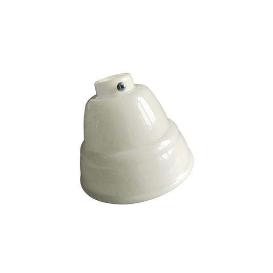 White plastic container with a cap on a white background